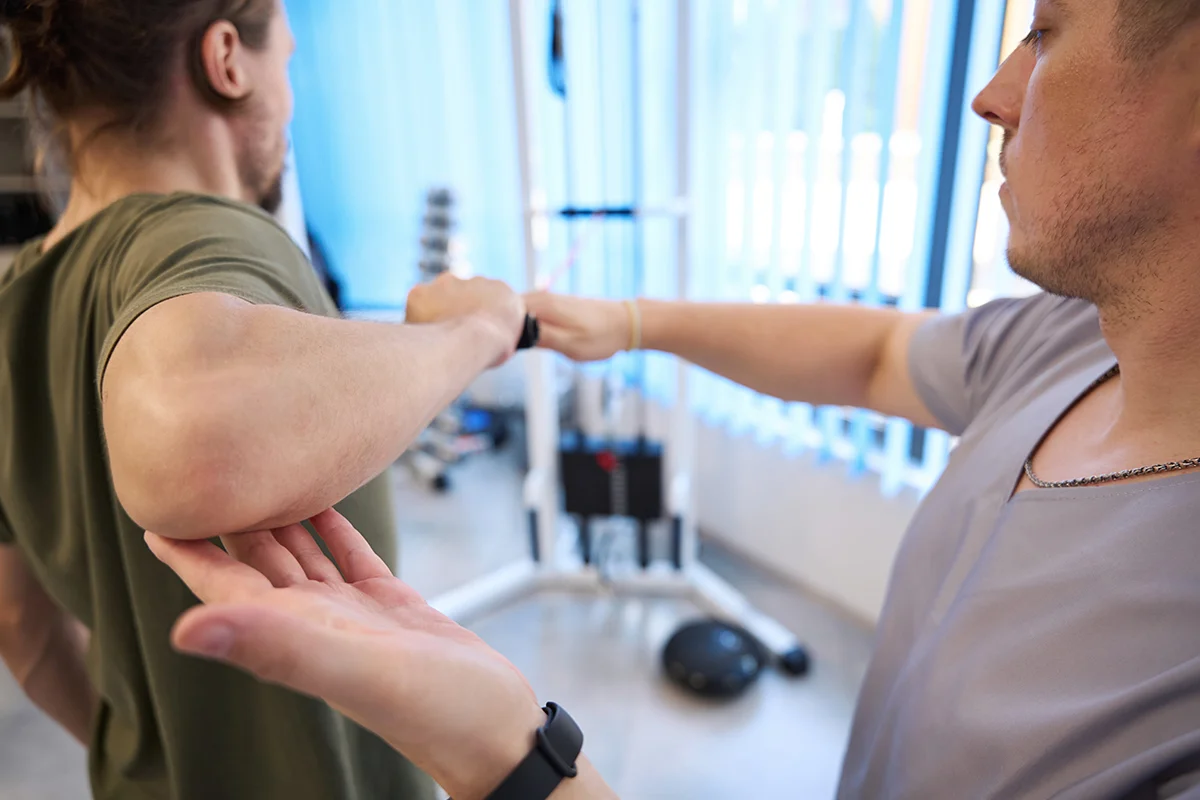 arm rehabilitation with a physical therapist